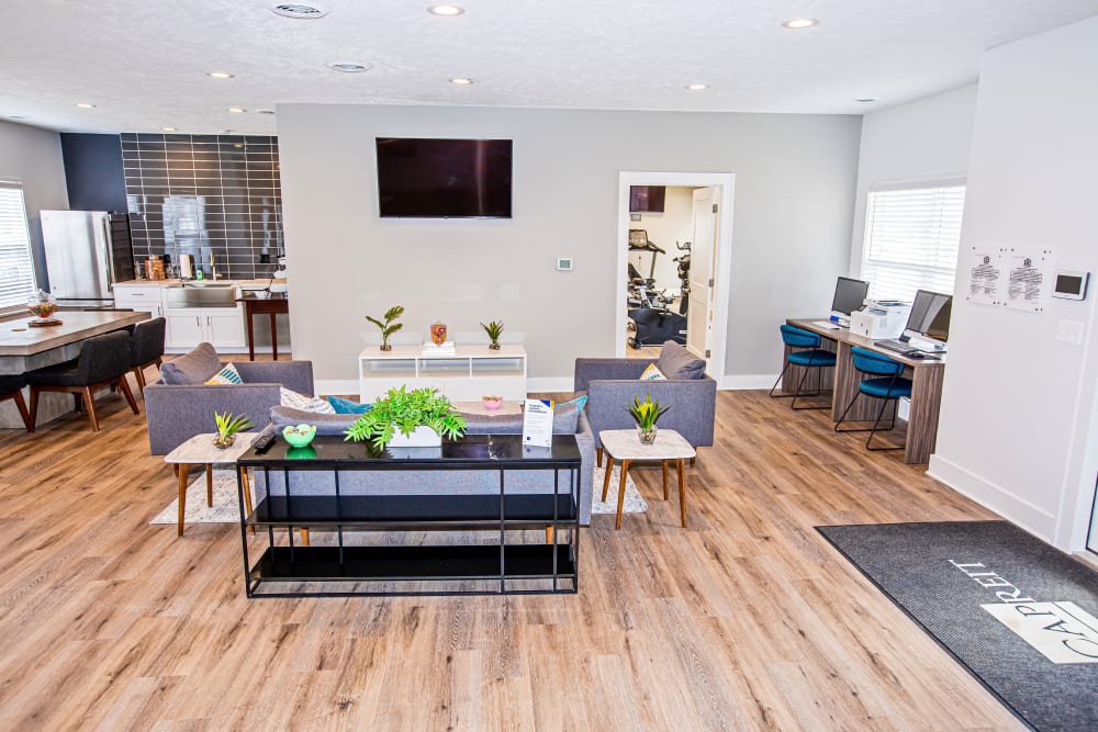 A community clubhouse with comfortable seating at Silver Lake Hills in Fenton, Michigan