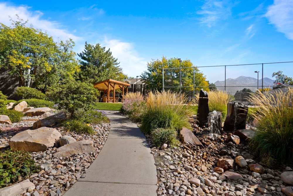 Path through the community at Royal Ridge Apartments in Midvale, Utah