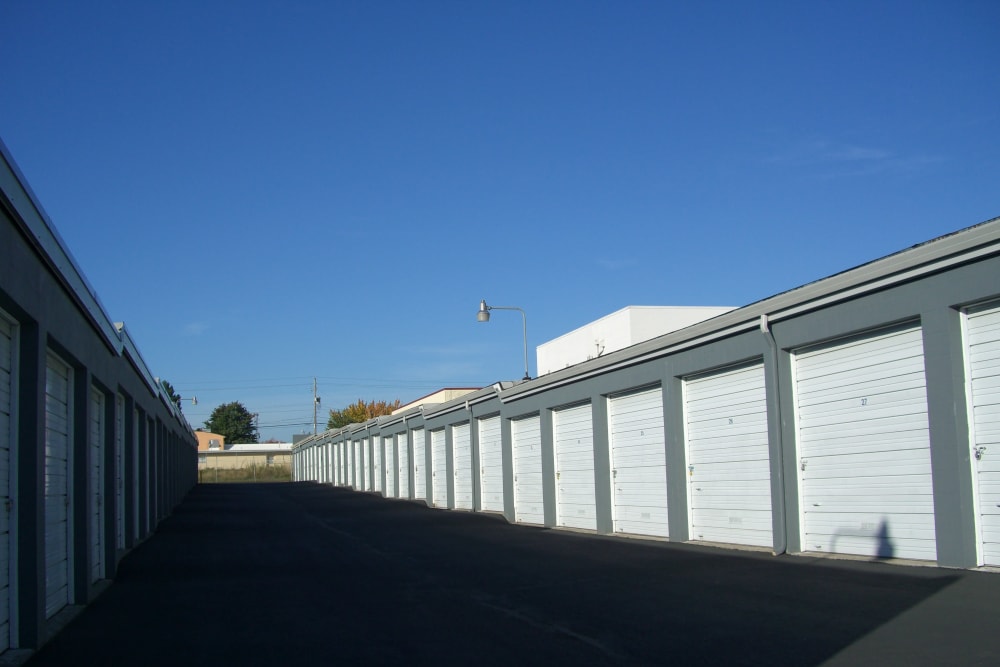 A wide driveway between rows of storage units at U-Lock-It Self Storage in Vancouver, Washington