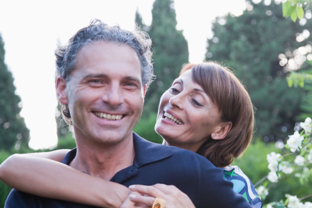 Resident couple enjoying the outdoors at Courtland Place in Seattle, Washington