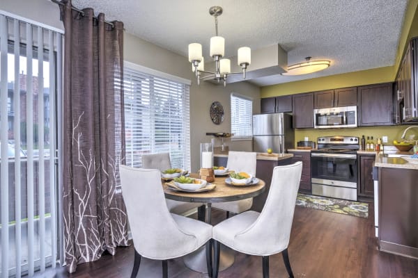 Kitchen and Living Room at Arapahoe Club Apartments in Denver