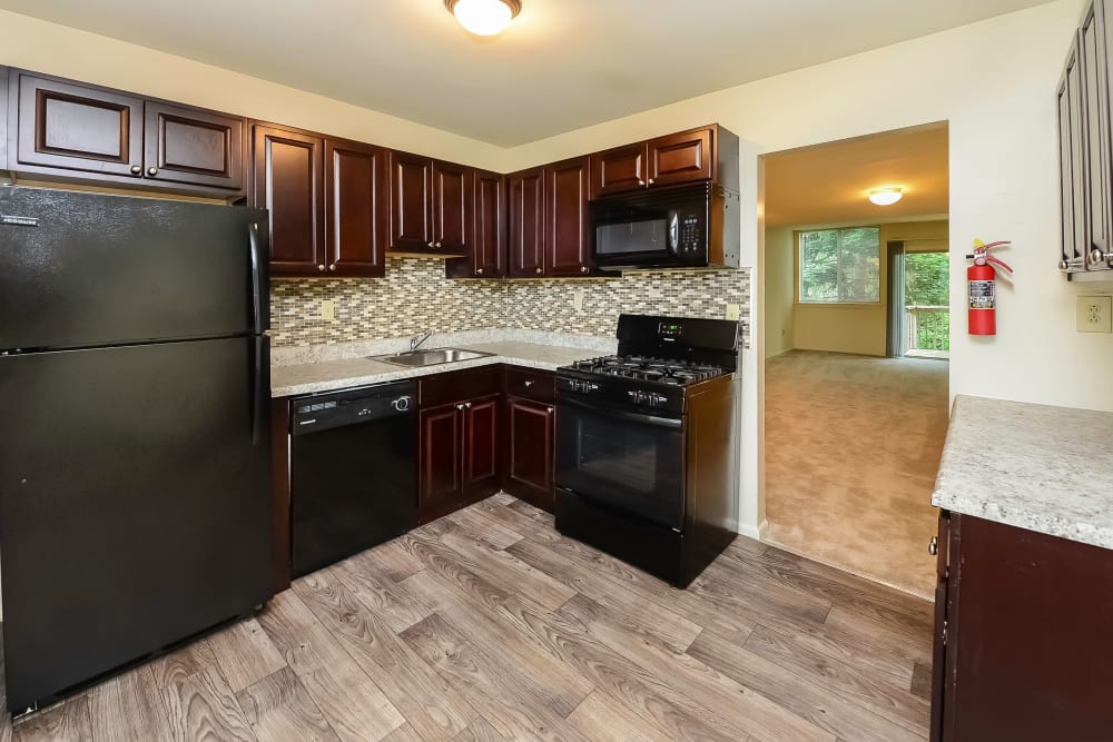 Fully equipped kitchen at Brockport Crossings Apartments & Townhomes in Brockport, New York