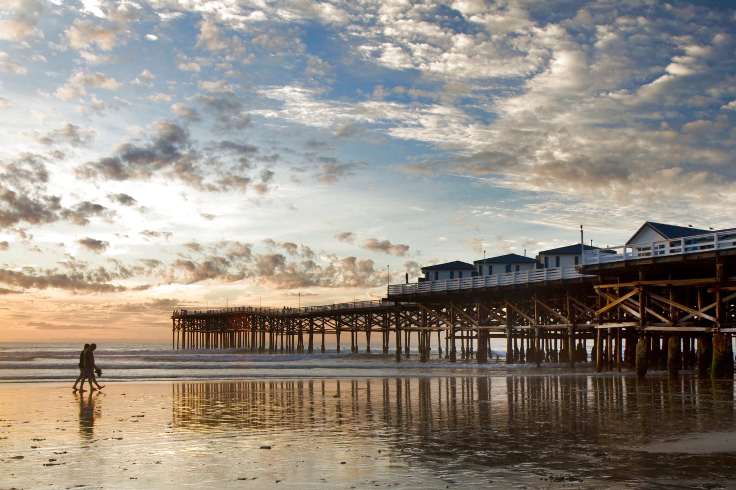 Pier stretches' into the ocean near Ocean Palms Apartments in San Diego, California
