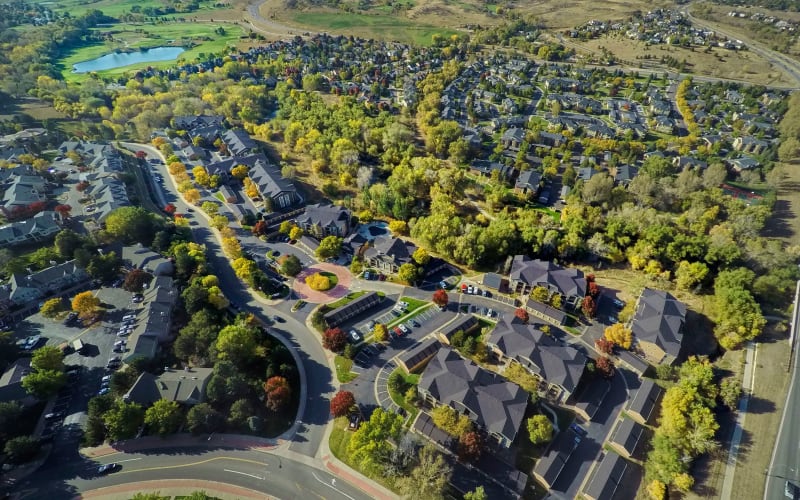 An aerial view of the property at The Crossings at Bear Creek Apartments in Lakewood, Colorado