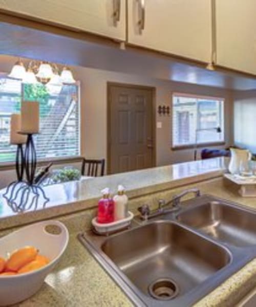 Kitchen with stainless-steel sink at The Station in Houston, Texas