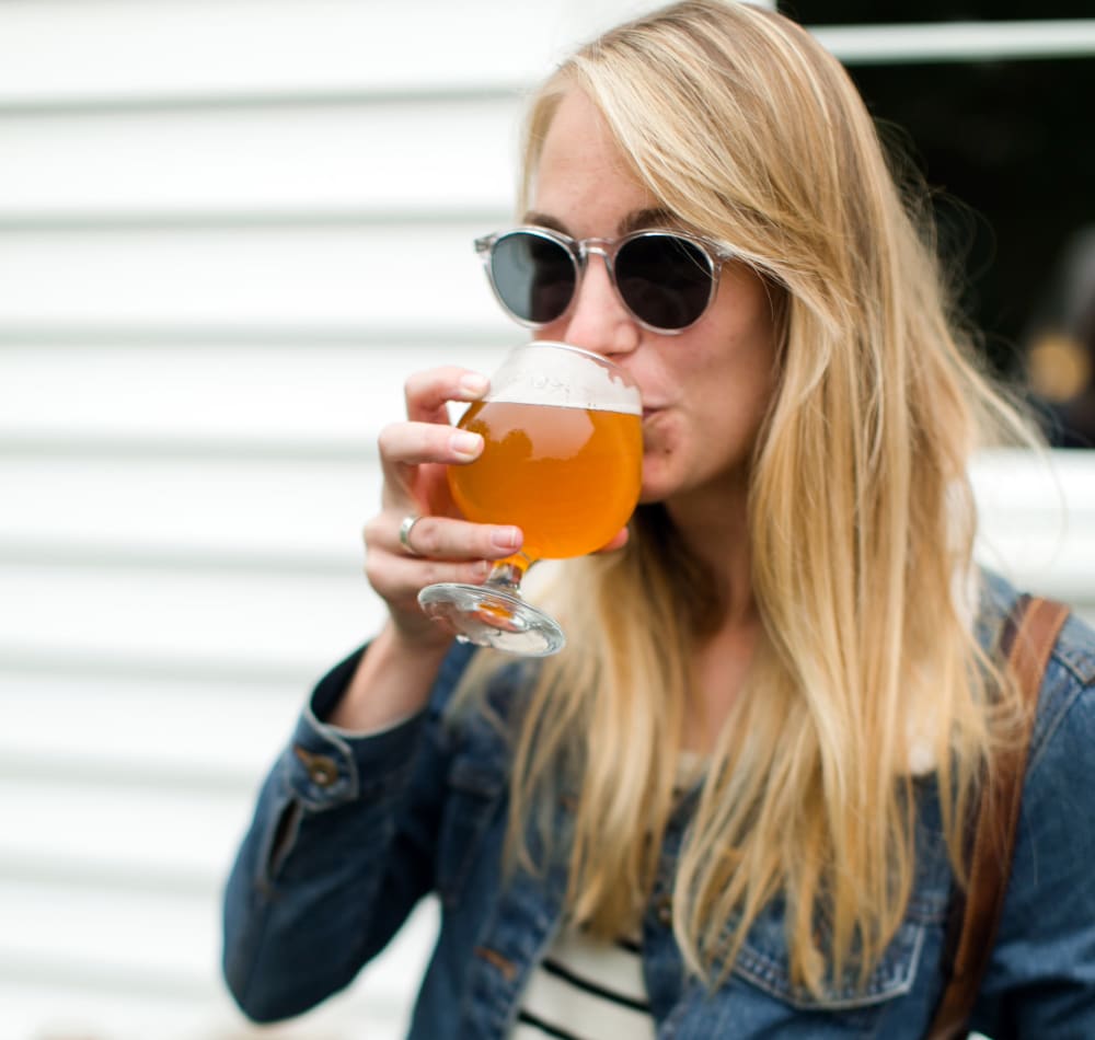 Resident enjoying a Northwest craft brew at Sofi at Forest Heights in Portland, Oregon