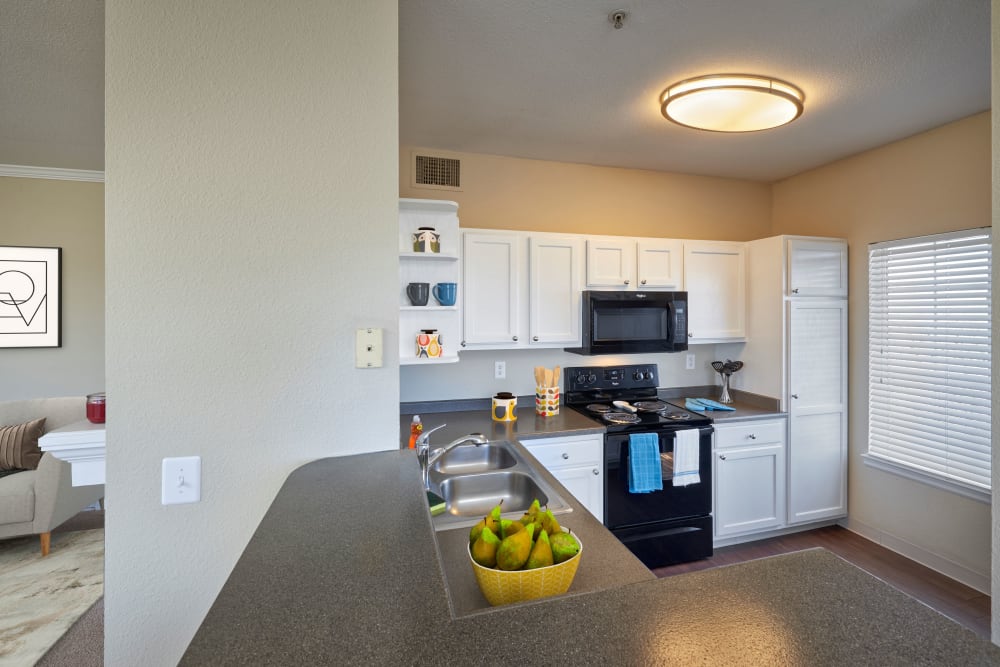 Kitchen with ample counter space at Skyecrest Apartments in Lakewood, Colorado