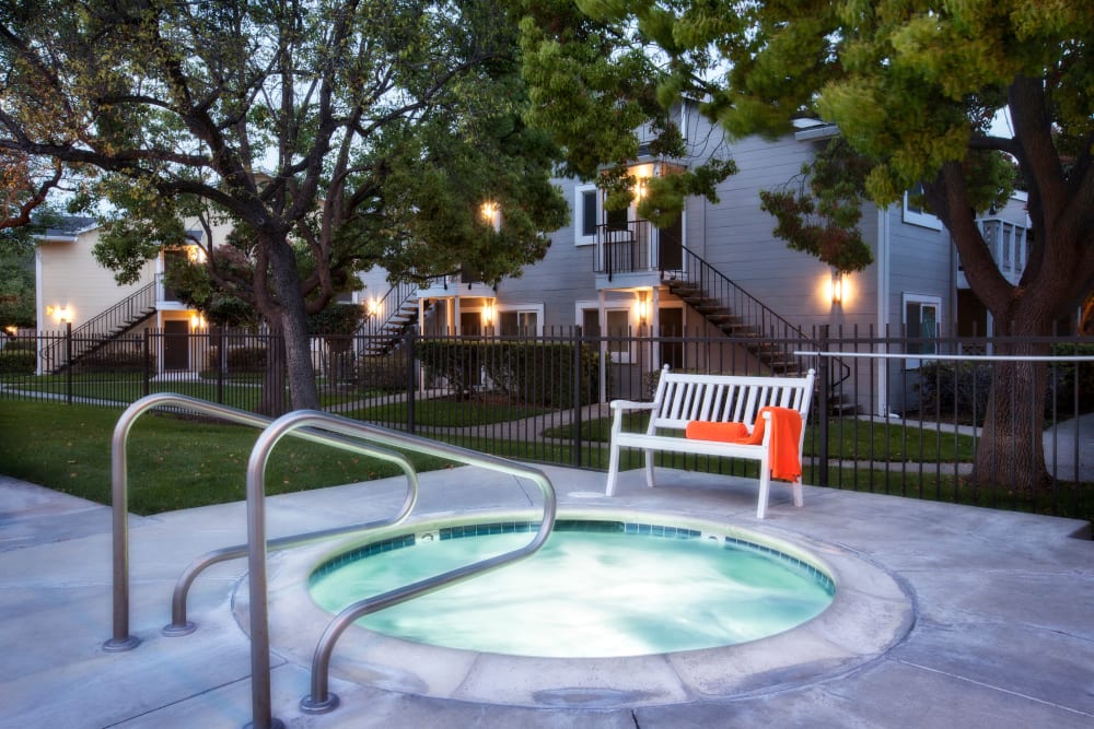 Enjoy an evening in the hot tub at Cypress Pointe Apartments in Gilroy, California