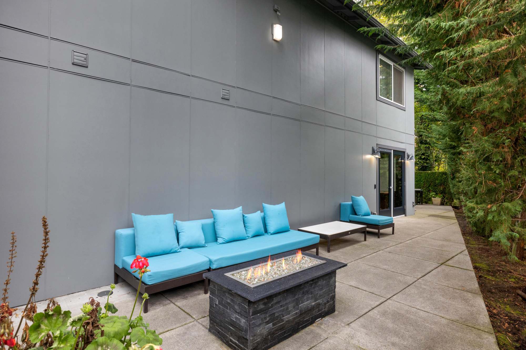 Fire pit lounge at Karbon Apartments in Newcastle, Washington