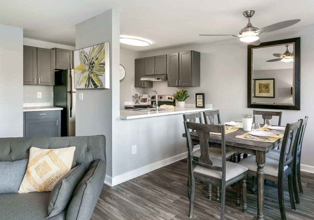 Spacious and modern open-concept layout with hardwood floors in a model home at Sofi Lakeside in Everett, Washington