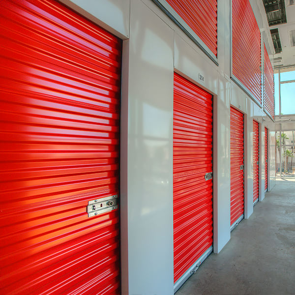 Red doors on indoor units at StorQuest Self Storage in Golf, Florida