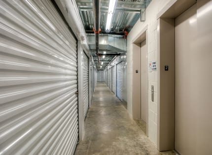 StorQuest Self Storage well lit hallway in West Babylon, New York