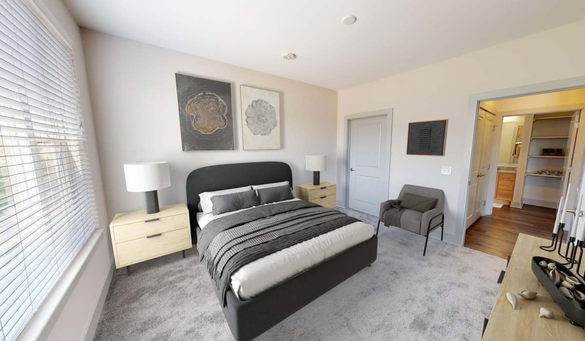 Cozy bedroom with carpet flooring at Gantry Apartments in Cincinnati, Ohio