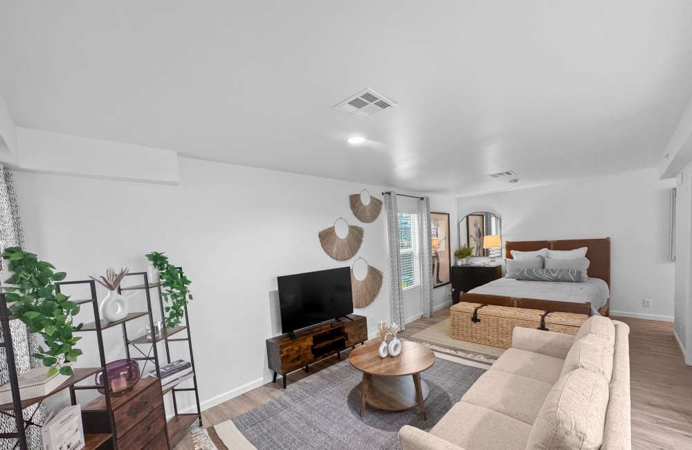 Living room with tv at The District North Hills in Raleigh, North Carolina