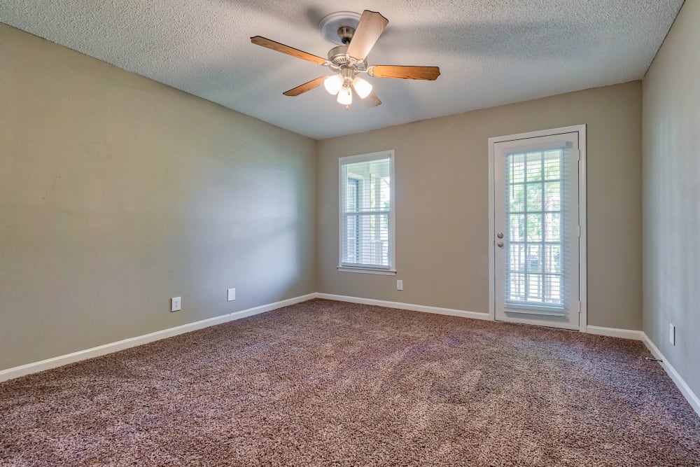 bedroom with a ceiling fan at The Gatsby at Midtown Apartment Living in Montgomery, Alabama