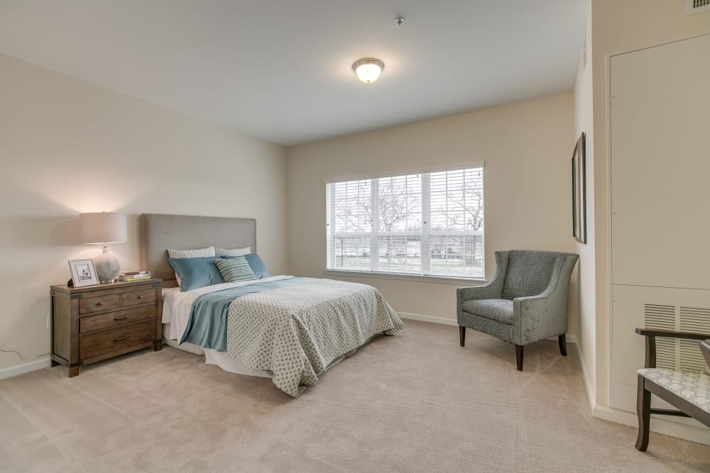 A spacious, decorated bedroom at Harmony at Victory Station in Murfreesboro, Tennessee