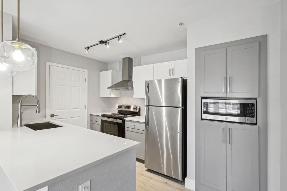 Kitchen with stainless-steel appliances at Lennox in Avondale,Arizona