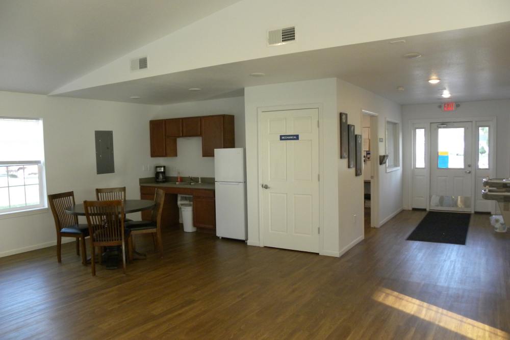 Modern living room with dining area at Manistique Lakeview in Manistique, Michigan