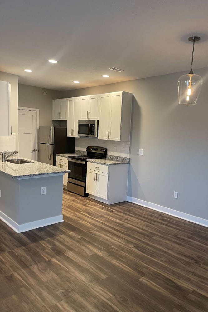 Resident kitchen with modern appliances at Meridian Oaks Apartments in Greenwood, Indiana