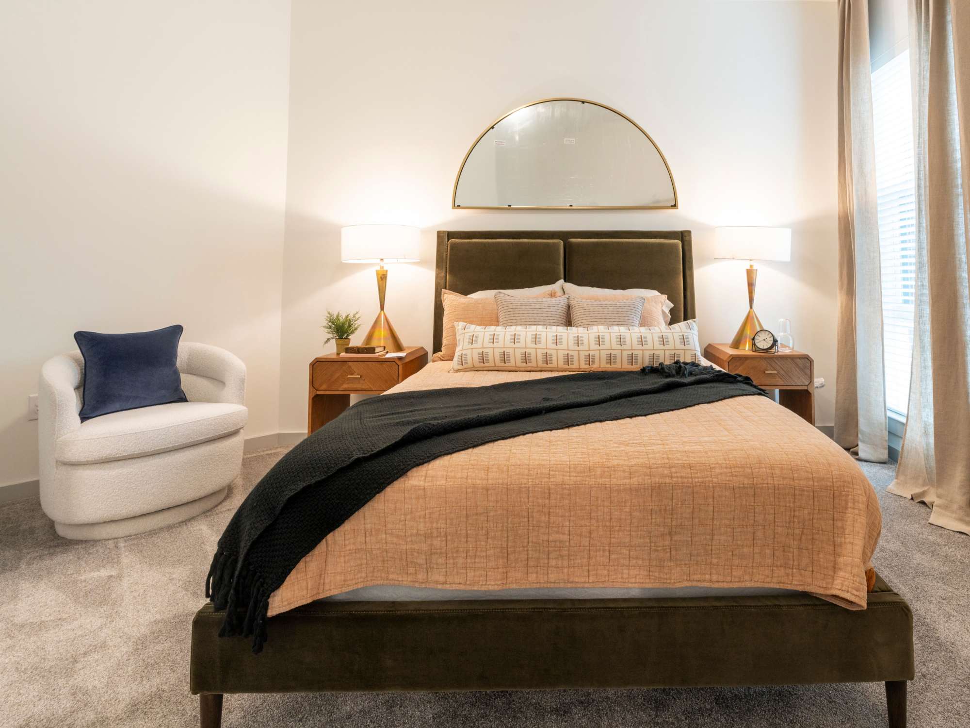 Bedroom with tall ceilings and large windows at Terrazzo in Durham, North Carolina