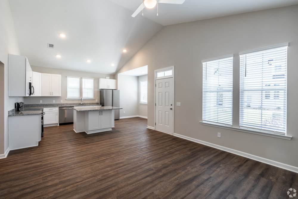 Modern spacious living room + kitchen at Argent Cottages in Hardeeville, South Carolina