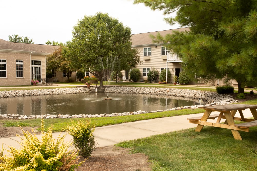 Path going around a large pond at Randall Residence of Decatur in Decatur, Illinois