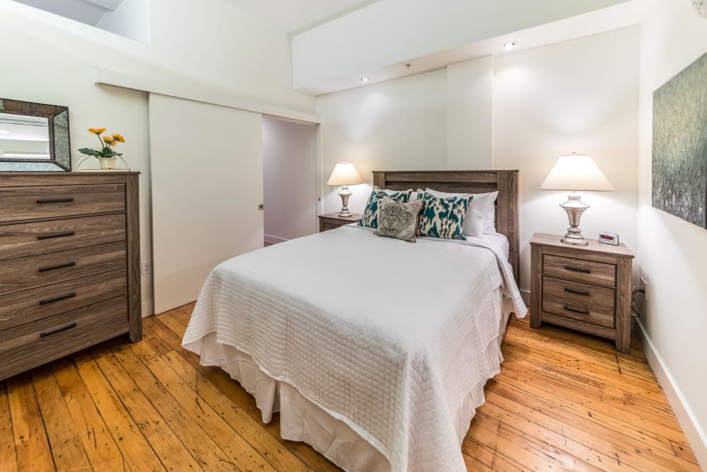 Spacious model bedroom at The Gallery Lofts in Winston Salem, North Carolina