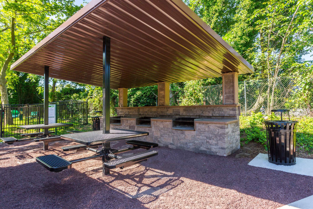 Covered Outdoor Dining & Grilling at Annen Woods Apartments in Pikesville, Maryland