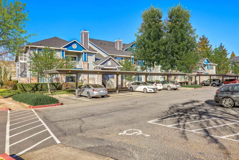 Covered parking area of the apartment at The Grove at Orenco Station in Hillsboro, Oregon