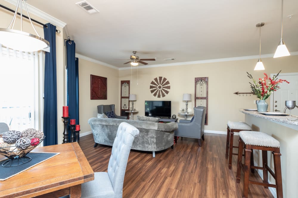 Open concept layout with hardwood floors at Hilltops in Conroe, Texas
