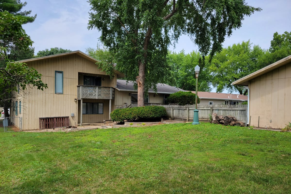 Mature trees around a home at Traditional Housing in Cedar Falls, Iowa