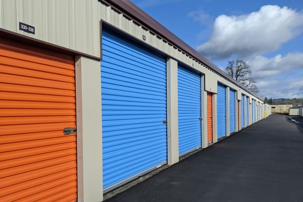 Blue and orange doors on storage units at Battle Ground Mini Storage in Battle Ground, Washington