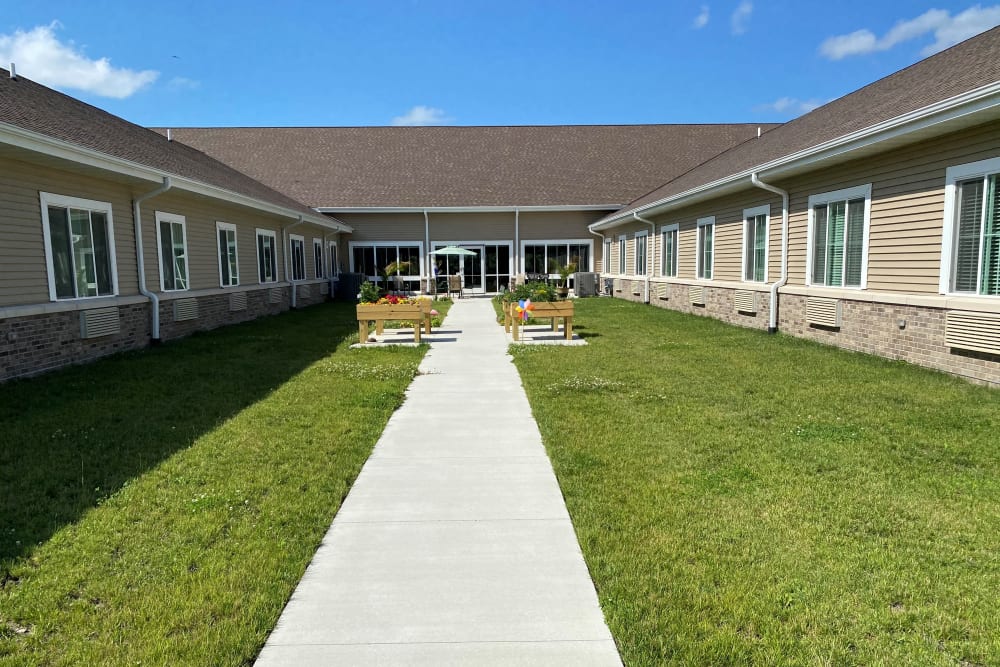 Enclosed courtyard with walking path at Country Meadow Place in Mason City, Iowa