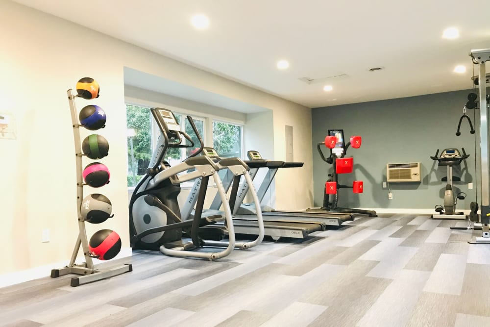 Fitness center with plenty of individual workout stations at Bennington Apartments in Fairfield, California