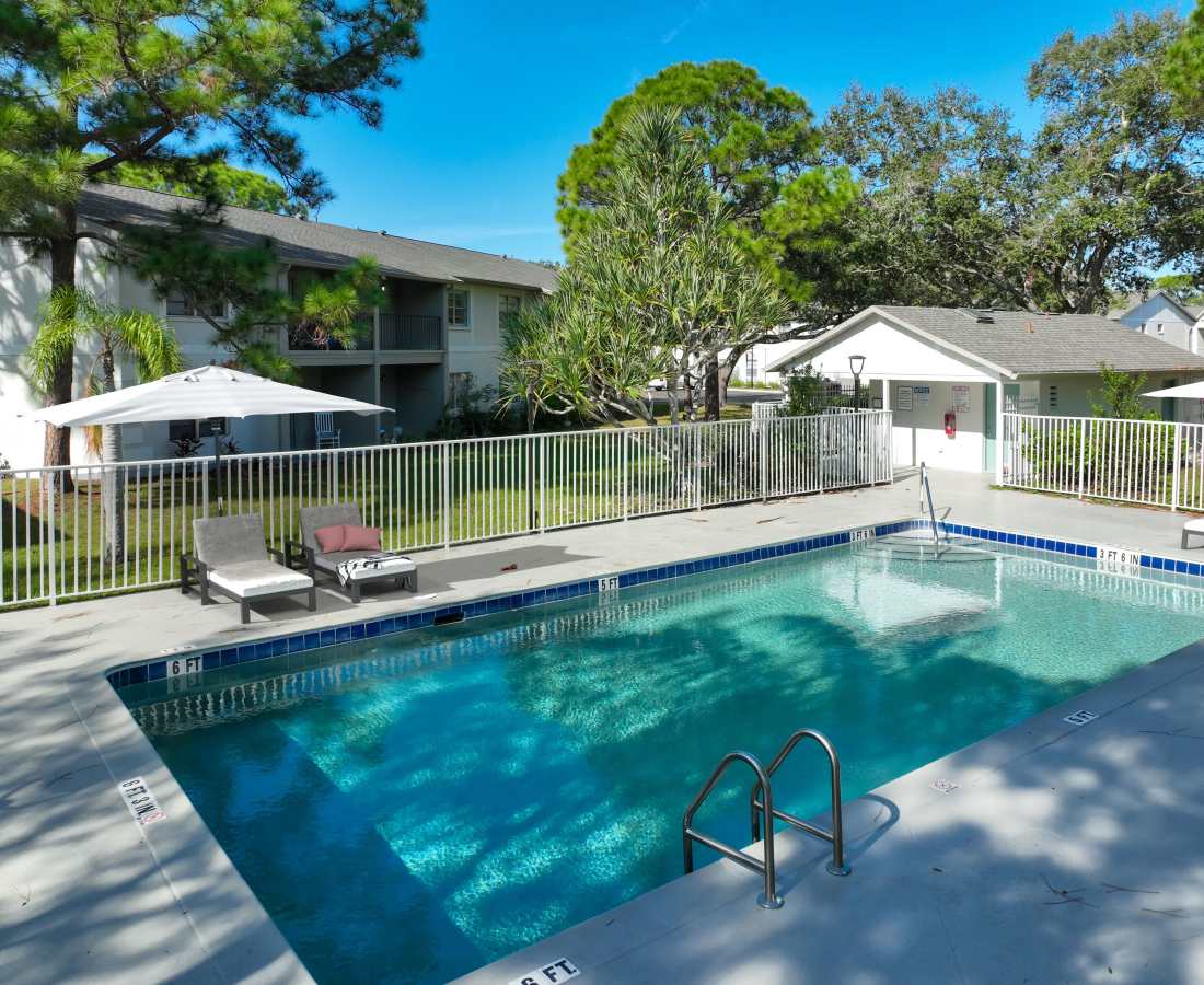 Pool area at Palm Bay Club in Palm Bay, Florida