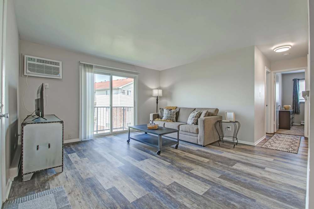Living room with view of balcony at Hidden Creek, Crown Point, Indiana