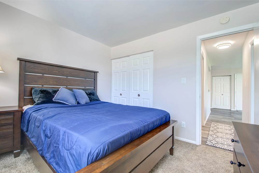 Bright bedroom with cozy and comfortable bed at Hidden Creek, Crown Point, Indiana