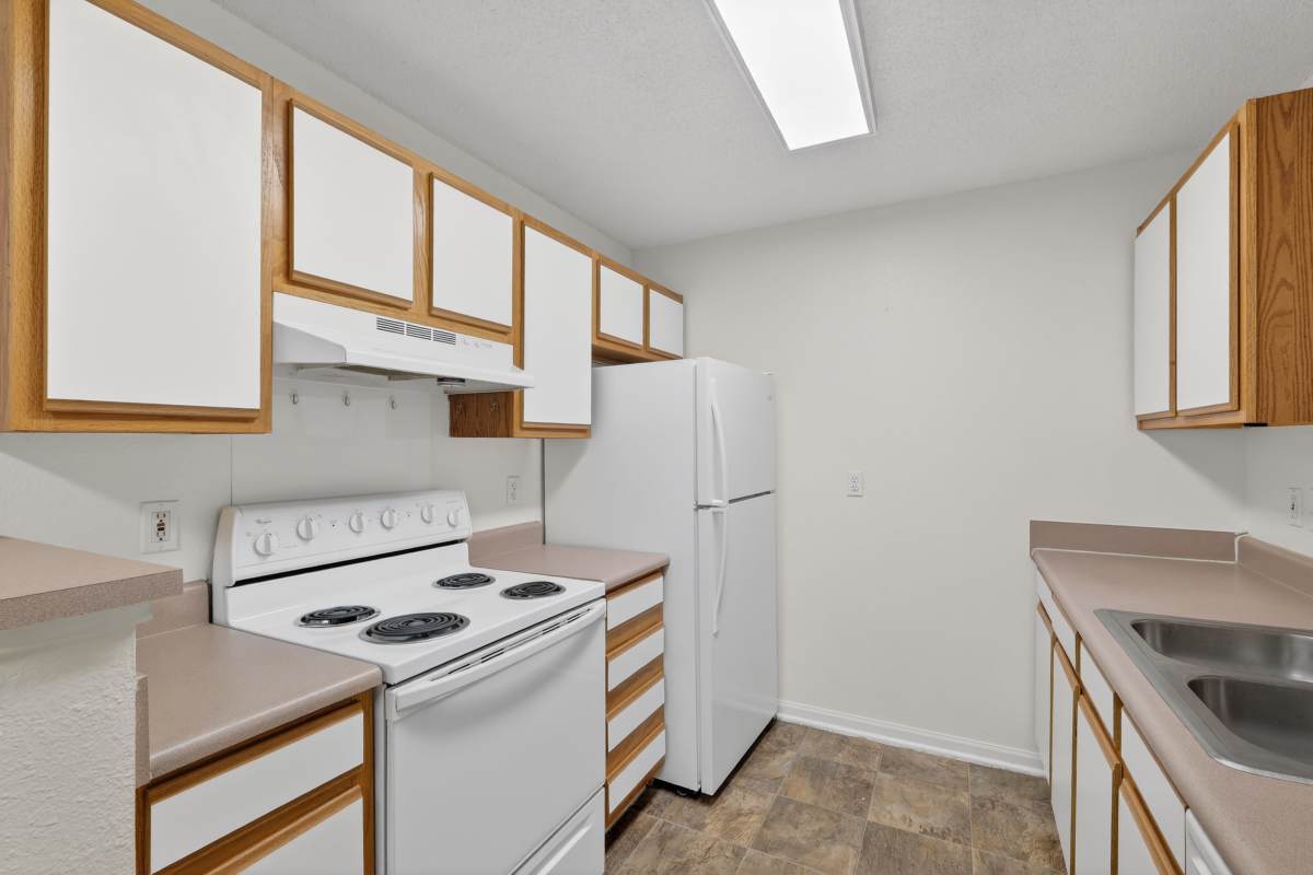 Kitchen with stainless-steel appliances at Grove Park in Paris, Tennessee