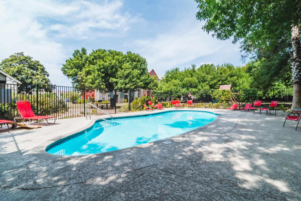 Resort-style swimming pool at Villa De Oro in San Antonio, Texas