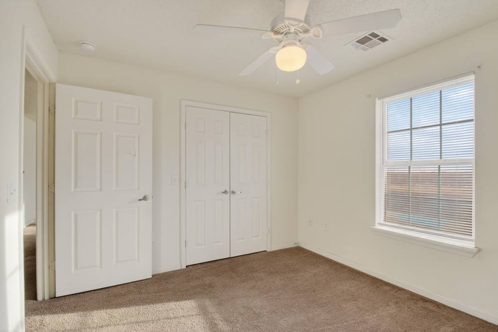 Bedroom with ventillation at Rose Meadows Apartments in Levelland,Texas