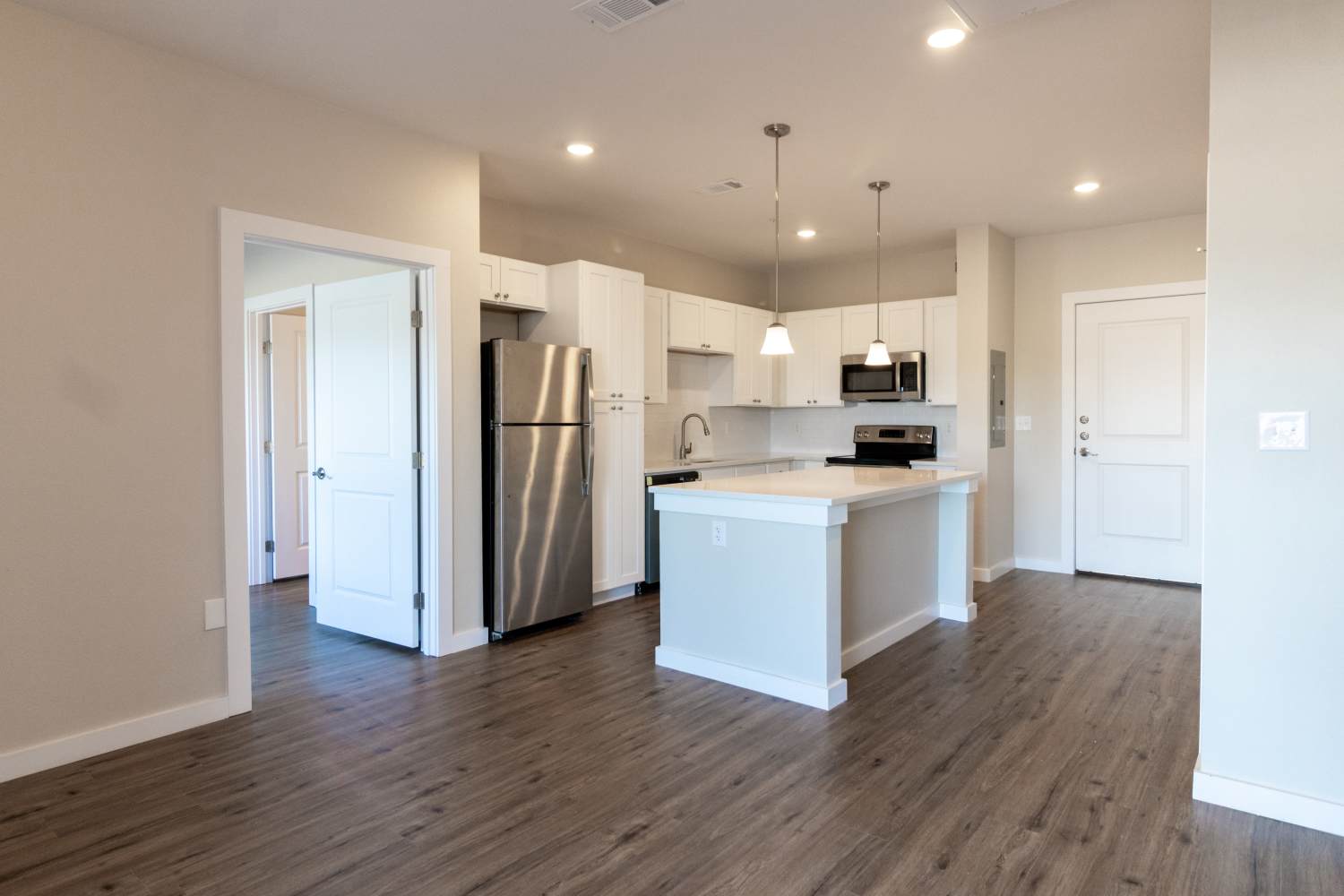 Kitchen with granite countertops at The Trail Lakes in Fort Worth, Texas
