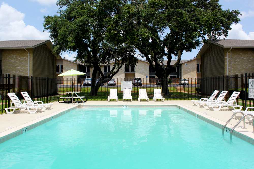 Large swimming pool at Tribecca Pointe Apartments in Hurst, Texas