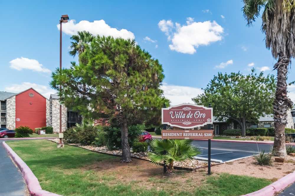 Signage with community view at Villa De Oro in San Antonio, Texas