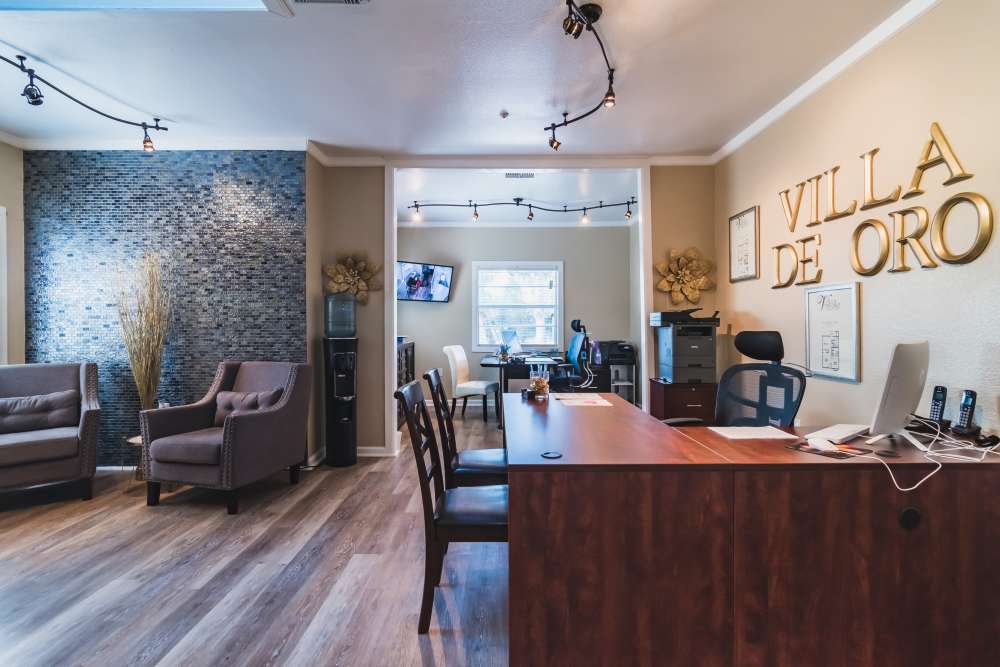 Leasing office with wood flooring at Villa De Oro in San Antonio, Texas