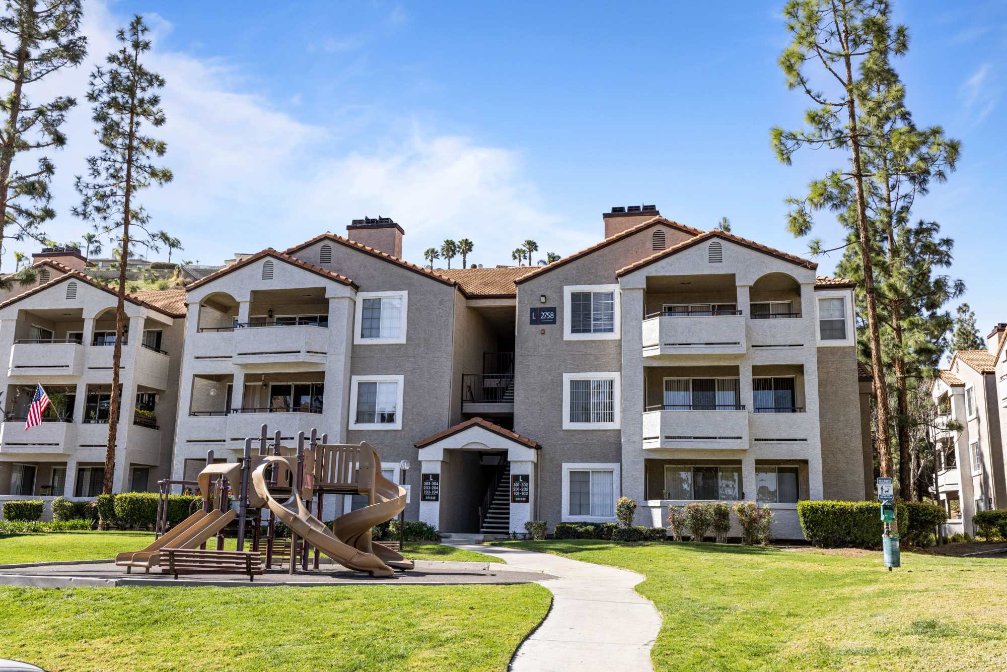 Children's playground of Sierra Del Oro Apartments in Corona, California