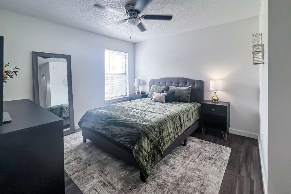 Spacious bedroom with window at Savannah Square & Savannah Harbor in Norman, Oklahoma