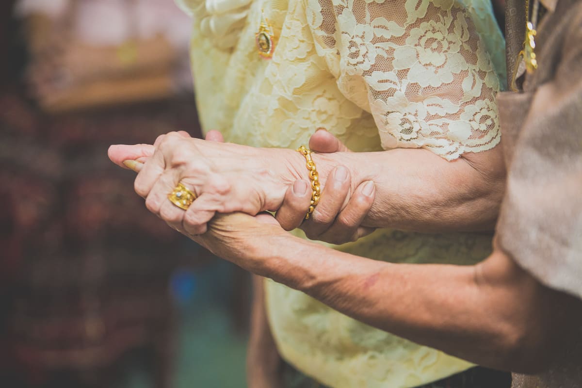 Caretaker assisting a resident at Courtyard at Mount Tabor in Portland, Oregon