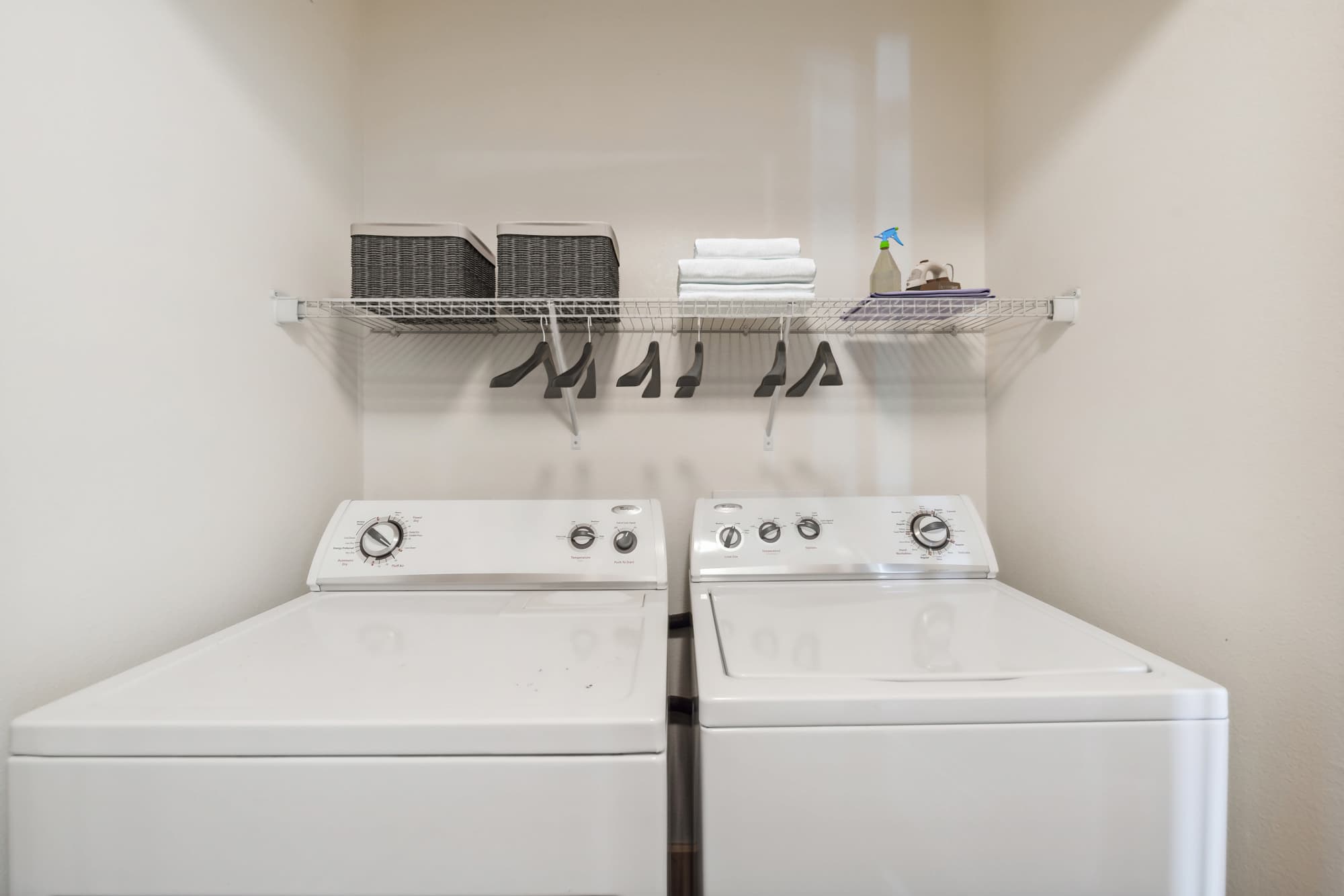 The laundry room at Villas at Grand Avenue in Pflugerville, Texas