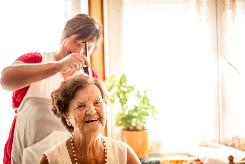 A resident enjoys a beauty day at the salon near Arlington Place of Pocahontas in Pocahontas, Iowa