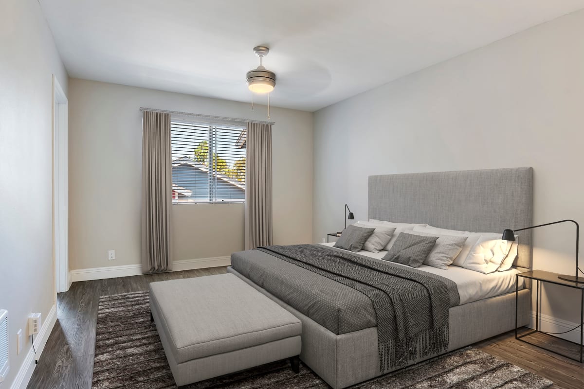 Bedroom with window at The Avenue at Carlsbad in Carlsbad, California